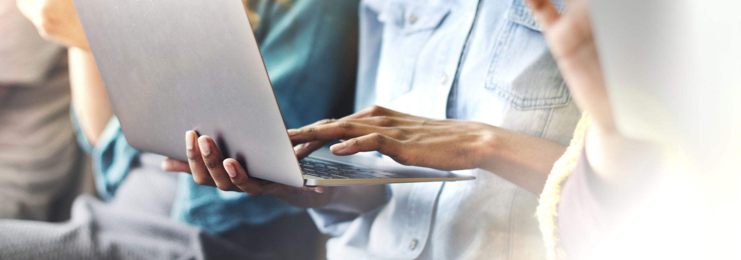 Woman on computer typing